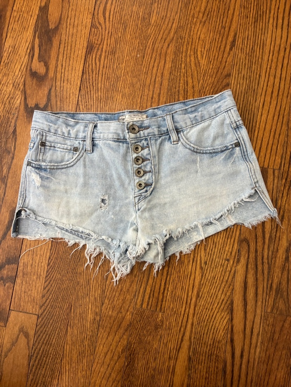 Free People Light Blue Distressed Button-Fly Denim Shorts size 24